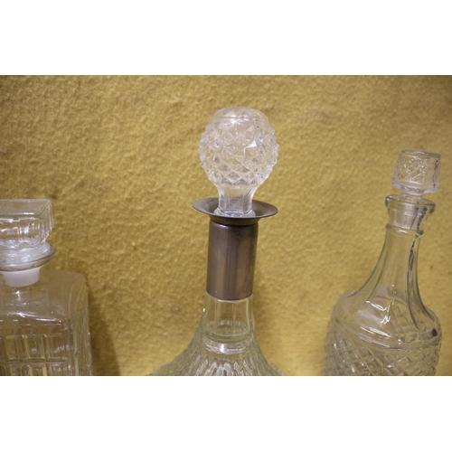 602 - Selection of Decanters including a Ships Decanter