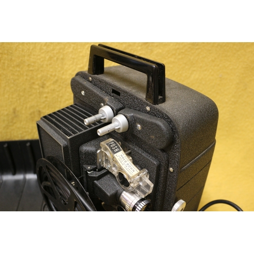 54 - Vintage Bell Howell Projector