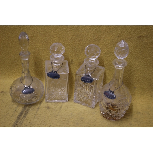 176 - 4 x Decanters with White Metal Swing Tags