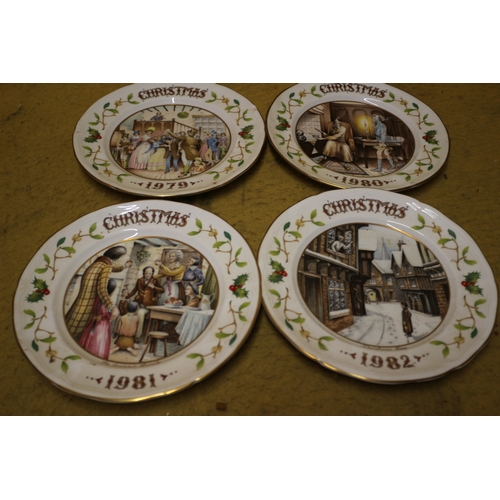 216 - 4 x Aynsley Bone China Highly Decorative Christmas Plates - 1979 to 1982