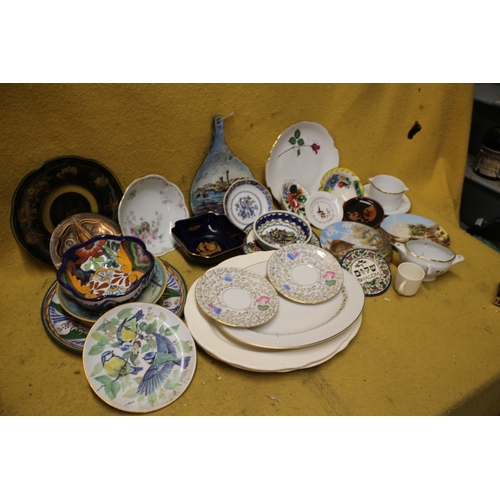 218 - Large Selection of Decorative Plates of Mixed Sizes and design plus Bowls