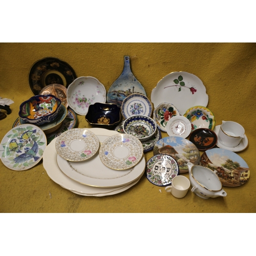 218 - Large Selection of Decorative Plates of Mixed Sizes and design plus Bowls