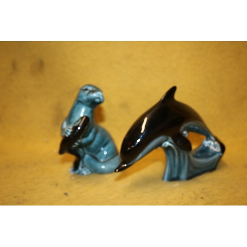 243 - 2 Poole Pottery Items - Dolphin and Otter