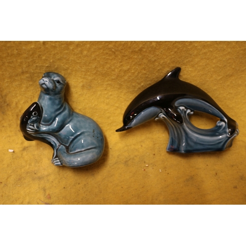 243 - 2 Poole Pottery Items - Dolphin and Otter