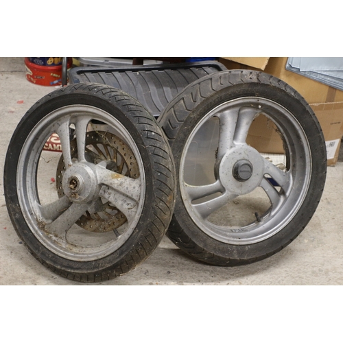 389 - 2 Motorbike Wheels, One from a Honda - 18in