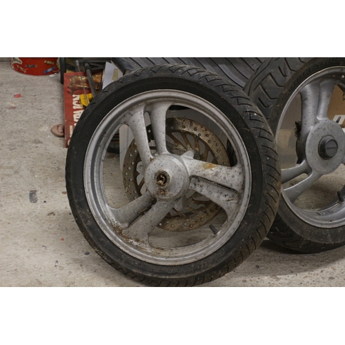 389 - 2 Motorbike Wheels, One from a Honda - 18in