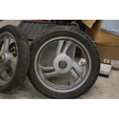 389 - 2 Motorbike Wheels, One from a Honda - 18in