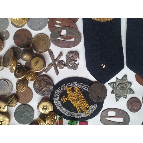 104 - A collection of militaria and coins.