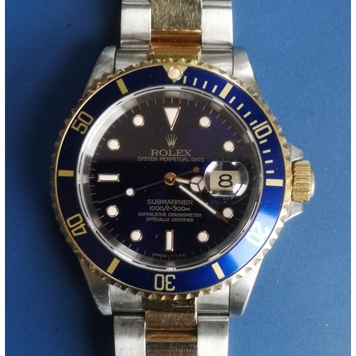 155 - A boxed gent's stainless steel & gold Rolex Oyster Perpetual Date Submariner Model 16613, having dar... 