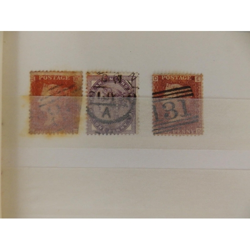 24 - A stock album containing mainly GB QEII stamps, but also two Penny Reds.