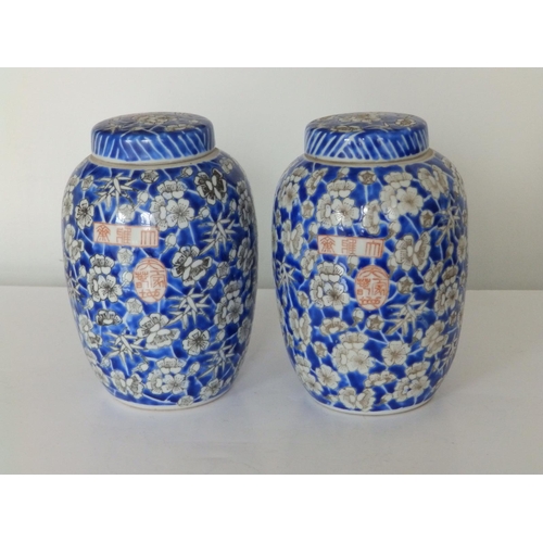 32 - A pair of 20thC Chinese blue & white porcelain ginger jars printed in hawthorn pattern, 6.5