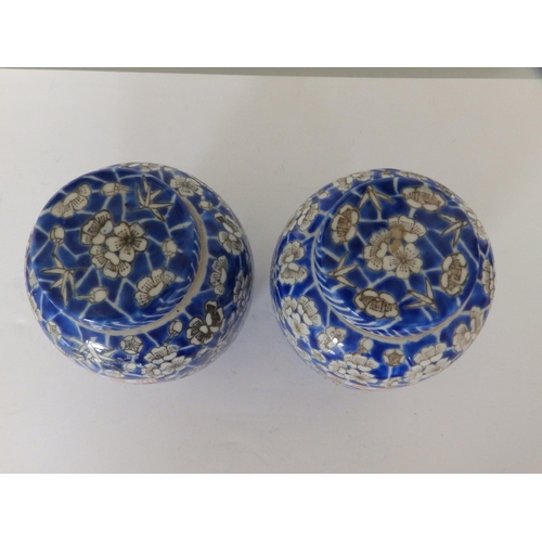 32 - A pair of 20thC Chinese blue & white porcelain ginger jars printed in hawthorn pattern, 6.5