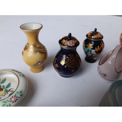 35 - A collection of 20thC miniature Oriental porcelain vases and baskets together with a Chinese interna... 