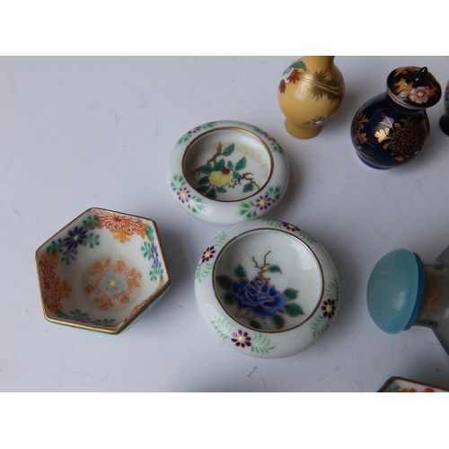 35 - A collection of 20thC miniature Oriental porcelain vases and baskets together with a Chinese interna... 