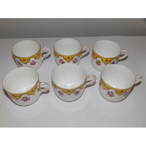 43 - An early 20thC Royal Worcester 19 piece tea set, decorated roses with yellow & gold borders in patte... 