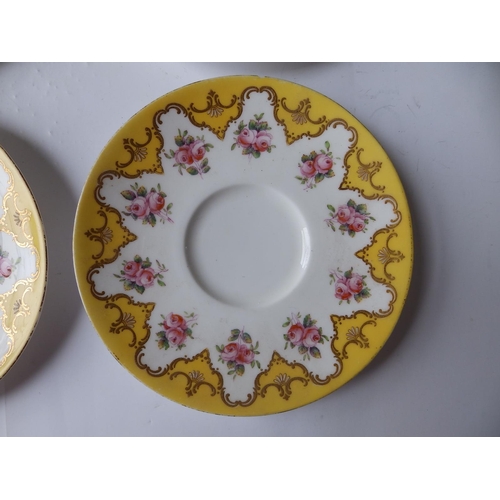 43 - An early 20thC Royal Worcester 19 piece tea set, decorated roses with yellow & gold borders in patte... 