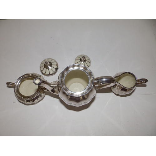 53 - A German Koenigszelt porcelain coffee set for 12 with silver mounts and onlaid decoration, comprisin... 