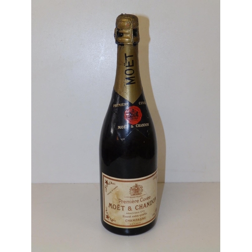 75 - A bottle of vintage Moet & Chandon champagne.