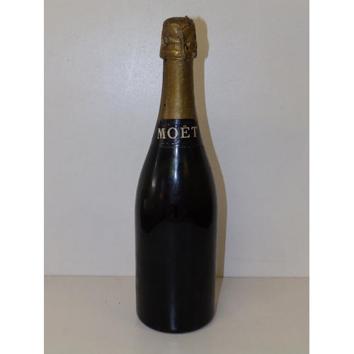 75 - A bottle of vintage Moet & Chandon champagne.