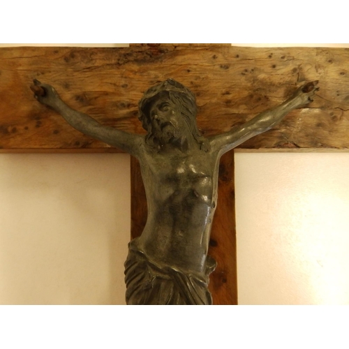 77 - A palmwood crucifix with verd-de-gris Christ figure,  13.5