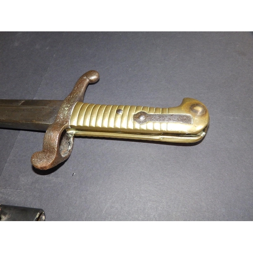 87 - A 19thC French  brass-hilt bayonet with 22.5