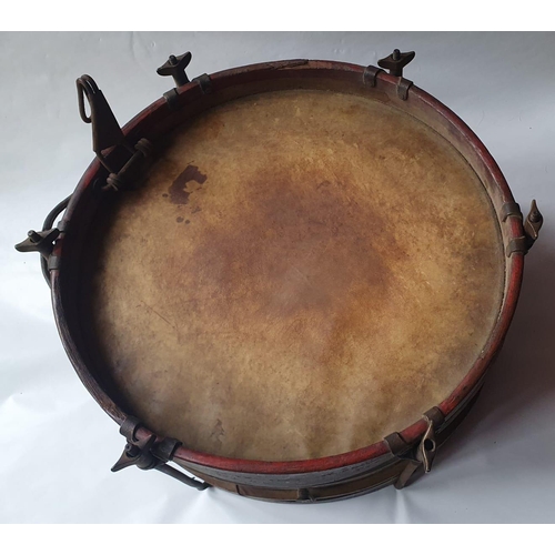 96 - An antique brass-mounted wooden drum with painted decoration, 15.5