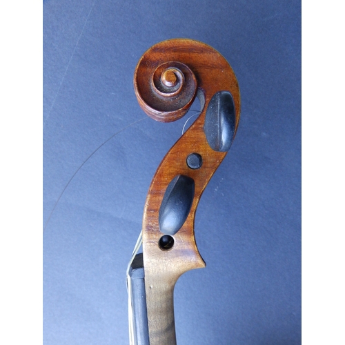 126 - An antique violin with bow in case, the violin having 14