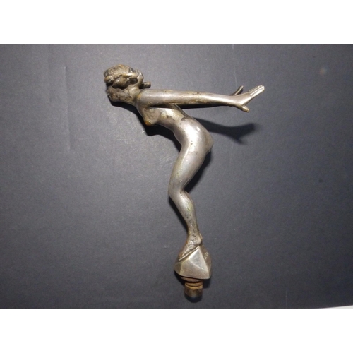 113a - A car mascot modelled as a nude female leaning into the wind - 'Reg'd. Des.', 6.75