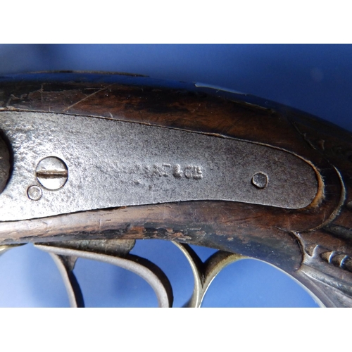 121 - A 19thC Brazilian percussion lock double-barrel pistol, indistinct maker's marks, the fluted & scale... 