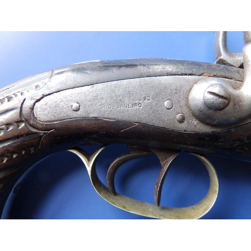 121 - A 19thC Brazilian percussion lock double-barrel pistol, indistinct maker's marks, the fluted & scale... 