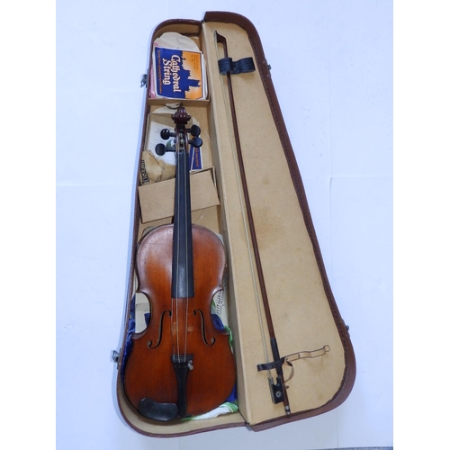 126 - An antique violin with bow in case, the violin having 14