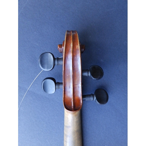 126 - An antique violin with bow in case, the violin having 14