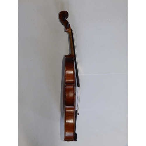 126 - An antique violin with bow in case, the violin having 14