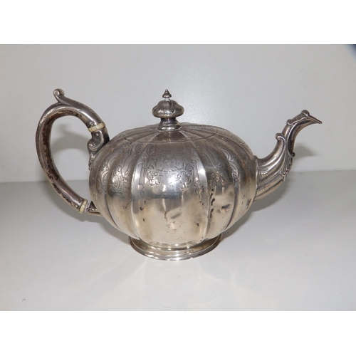 132 - A Victorian lobed circular teapot, WM London 1858,  8.75