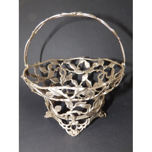 145 - An early Victorian silver openwork swing-handled sweetmeat basket frame, formed as leafy branches - ... 