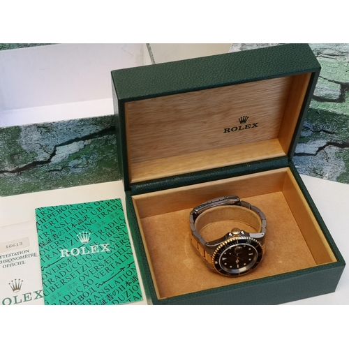 156 - A boxed gent's gold & stainless steel Rolex Oyster Perpetual Date Submariner Model 16613, having bla... 