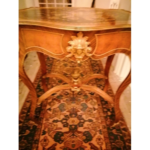 59 - A continental style gilt metal mounted centre table to match the previous lot , the legs united by X... 