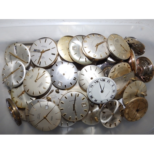 149a - A large collection of antique and vintage wrist  & pocket watch movements, dials and parts, includin... 