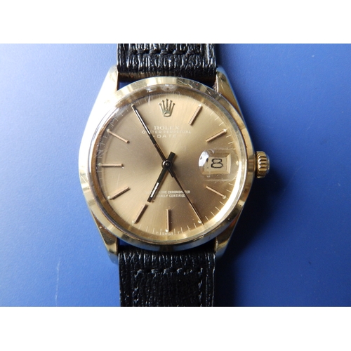 157 - A gent's 14ct gold Rolex Oyster Perpetual Date wrist watch with gold dial & baton markers, 33mm diam... 