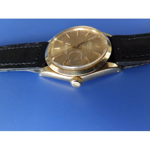 157 - A gent's 14ct gold Rolex Oyster Perpetual Date wrist watch with gold dial & baton markers, 33mm diam... 