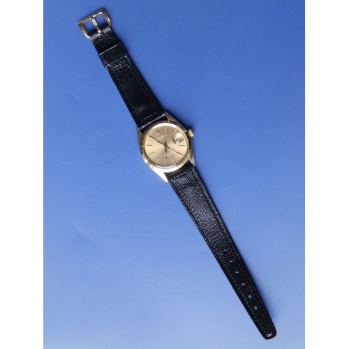 157 - A gent's 14ct gold Rolex Oyster Perpetual Date wrist watch with gold dial & baton markers, 33mm diam... 