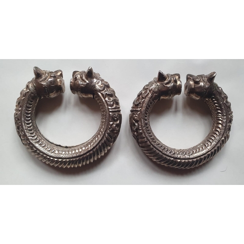 178 - Two Eastern white metal bangles, 3.5