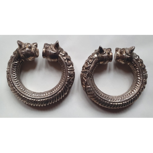 178 - Two Eastern white metal bangles, 3.5