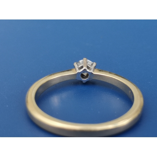 182 - A modern diamond solitaire ring, the claw set brilliant weighing approximately 0.25 carat, on 18ct g... 