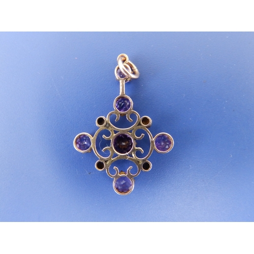 188 - An early 20thC amethyst & pearl set yellow metal pendant, 1.2