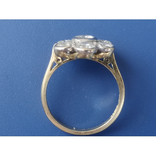 190 - A diamond 'daisy' cluster ring, the seven collet set brilliants of total weight approximately 1.8 ca... 