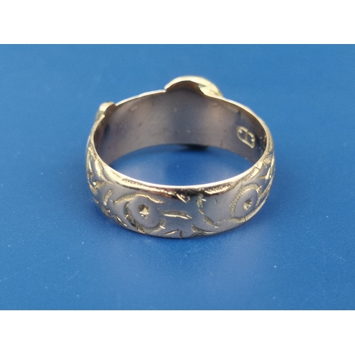 205 - An 18ct gold buckle band ring, Chester marks.  Finger size N/O.