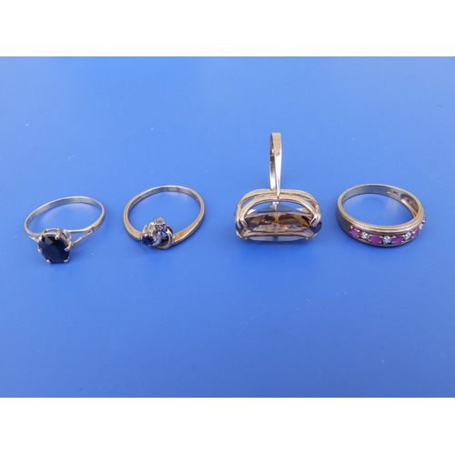 218 - Four gem set 9ct rings.