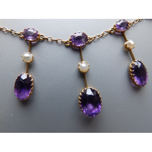 163 - A late Victorian/Edwardian amethyst & pearl set gold fringe necklace, 17.5