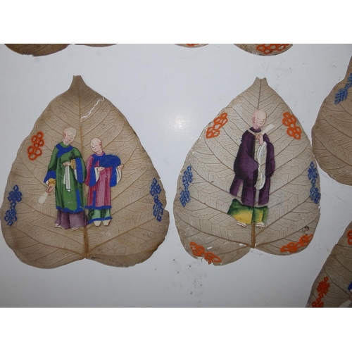 4 - 11 Chinese Qing Dynasty 'sacred fig' paintings on Peepal (Bodhi) leaves, each depicting either one o... 